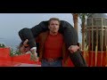Arnold Schwarzenegger On The Roof Of A Building Last Action Hero 1993