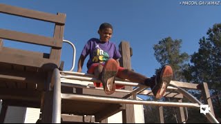Police officers buy bullied boy new tennis shoes
