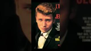 Les bras en croix Johnny Hallyday.