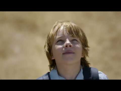 End-title style trailer still, quiet night exterior evoking reflective closing song