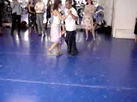  Osvaldo Zotto  and  Lorena Ermocida  are  dancing  to  the  tango  "  Manana Zarpa Un Barco  "