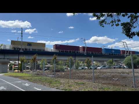 Long Freight Trains passing Noble Park Melbourne Australia in 4K