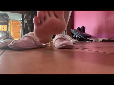 Close-up: Peeling off damp slippers after an intense workout