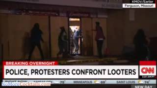After police say they will use less force, black people in Ferguson still riot and loot