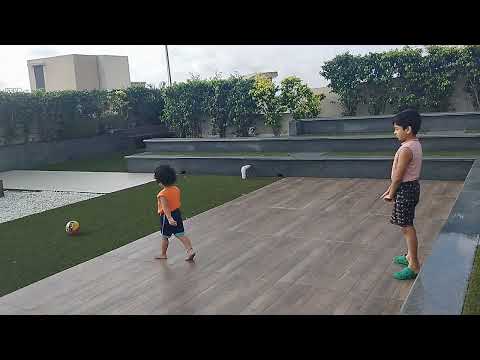 viren and viresh playing footbal doing goals
