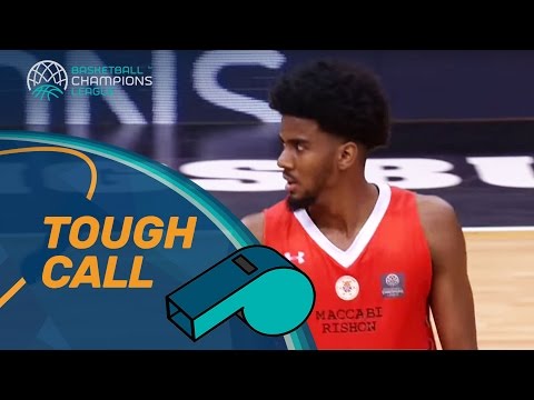 Tough Call: Basket interference by defensive player on goal attempt, pushing his hand up through