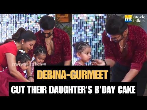 Gurmeet Choudhary and Debina Bonnerjee cut their daughter Divisha’s birthday cake