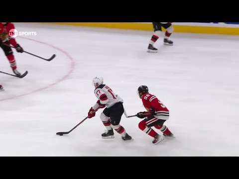 Simon Nemec scores a goal against the Chicago Blackhawks