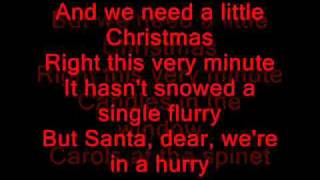 Glee Cast - We Need a Little Christmas Lyrics on screen