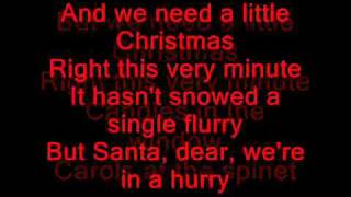 Glee Cast - We Need a Little Christmas Lyrics on screen