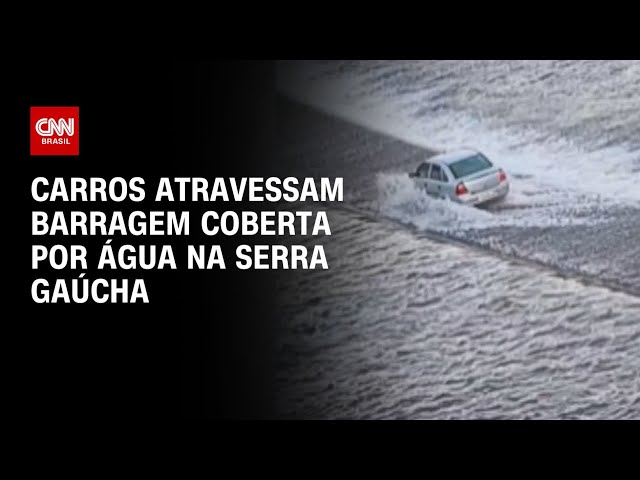 Carros atravessam barragem coberta por água no Rio Grande do Sul | CNN PRIME TIME