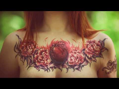 татуировки на женской груди/tattoos on a woman's breasts