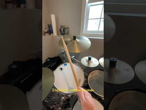 Assortment of Zildjian K cymbals through iPhone