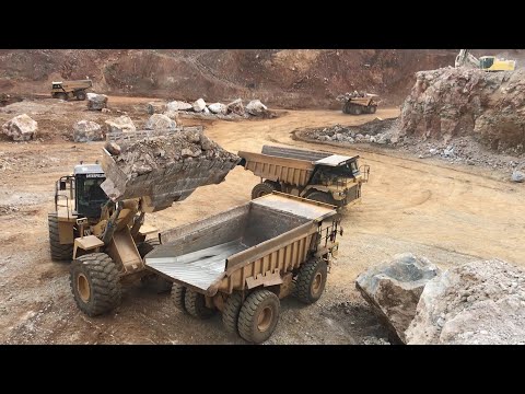 Caterpillar 992G Wheel Loader Loading Cat Dumpers On A Metal Mine - Sotiriadis/Labrianidis Mining