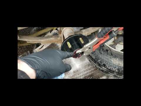 How to replace the wheel hub spindle on a trailer axle, wheel bearing assembly