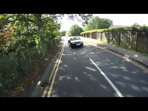 AM08WAE - Drives Car At Cyclist