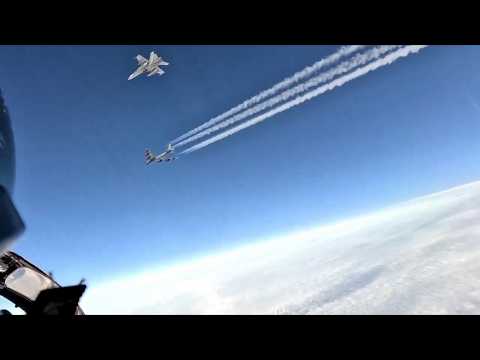 Finnish Air Force F/A-18 Hornet fighters escorting two B-52 bombers to the Rovajärvi firing range