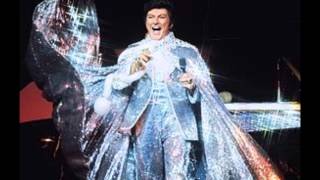Liberace plays "Charade"