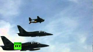 Amazing Video: 'Jet Man' stunts alongside fighter jets over Alps