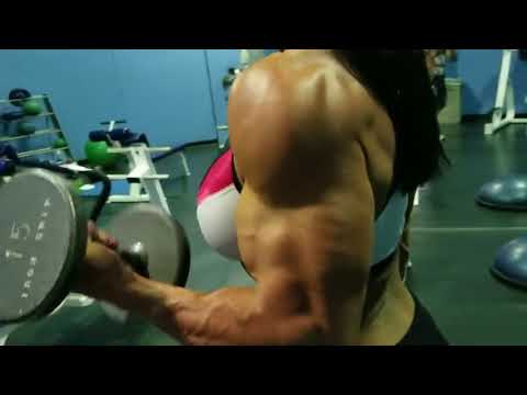 Female Bodybuilder In Gym