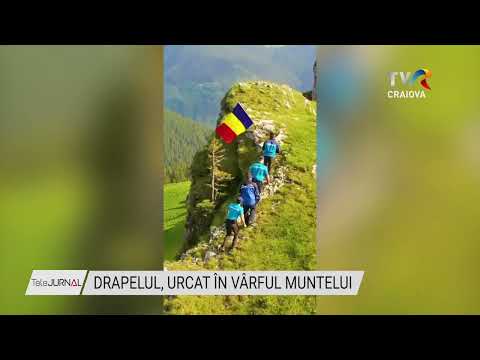 DRAPELUL, URCAT ÎN VÂRFUL MUNTELUI