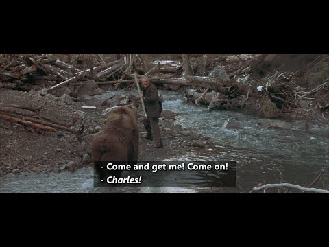 The Edge (1997) Charles stabs it and bear advances on him It rears onto its hind legs and collapses