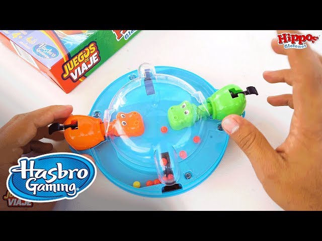 Vídeo relacionado con Hasbro Gaming Tragabolas Grab and Go, Hipopótamos de Juguete, Habilidad y Estrategia, 2 Jugadores, Edición Bolsillo, Idea de Regalo para Niños y Niñas de 4 Años en Adelante