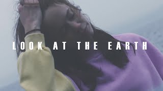 Musik-Video-Miniaturansicht zu Look At The Earth Songtext von Lilly Among Clouds