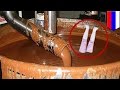 Russian woman drops cellphone into vat of molten chocolate, dies trying to get it back - TomoNews