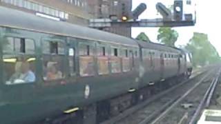 preview picture of video '1st Steam Train from Swanage for 36 years to leave Woking May 3 2009'