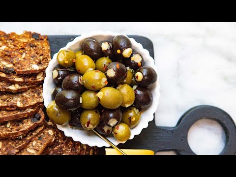 The Easiest Olive Recipe: How To Make Garlic Confit Stuffed Olives (Full recipe in description.)