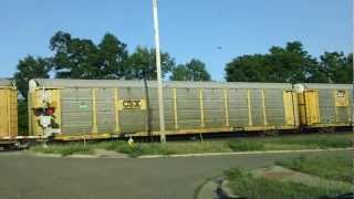 preview picture of video 'CSX Train Crossing at a Charlotte, MI crossing'