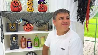 Dad decorates the house for Halloween for Nastya