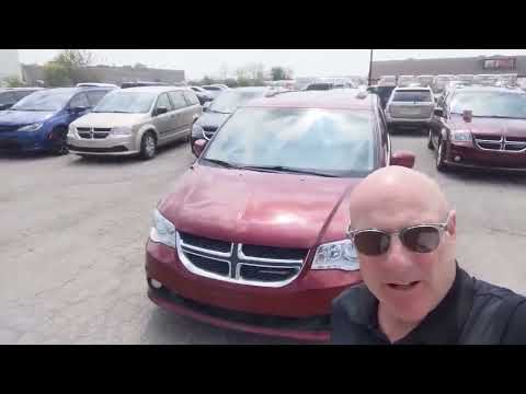 2016 Dodge Grand Caravan 4dr Wgn Crew Plus in Red for sale at Kitchener Chrysler Dodge Jeep Ram in Kitchener, ON
