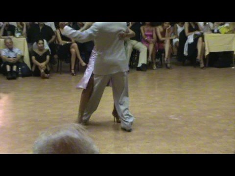  Roxana Suarez  and  Sebastian Achaval  are  dancing  to  the  tango  "  Tormenta  "
