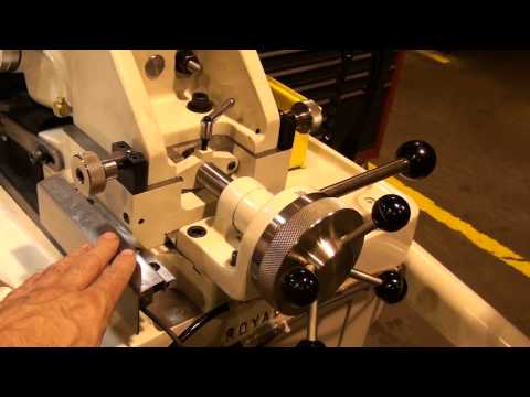 TG-12x4 Centerless Grinder set up to thrufeed grind carbide from .25" to 1" in diameter