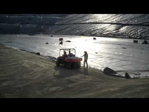 Installing 80 Mill HDPE Liner at Juniper Ridge Landfill