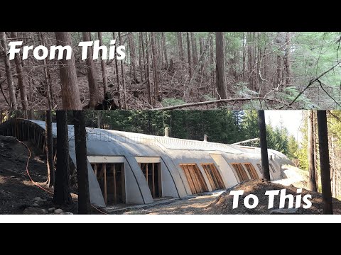 Retired couple developing raw land and building unique house in the woods.