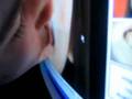 Zach kissing a computer screen 