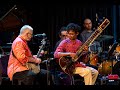 "Coleman’s March" Trad. arr. Cathy Fink, banjo • feat. Snehesh Nag, sitar & Tom Teasley, percussion
