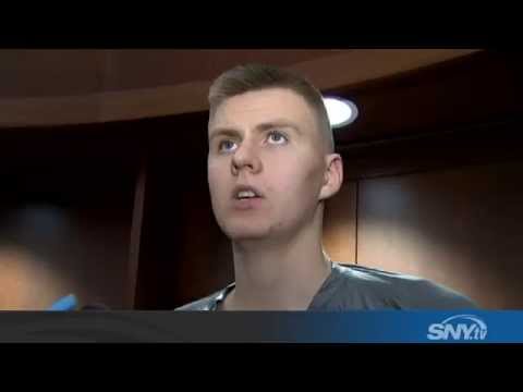 Knicks fall to Spurs, Carmelo falls on Porzingis' neck