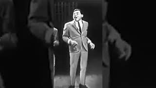 Smokey Robinson and The Miracles singing their 1961 hit “Shop Around.”