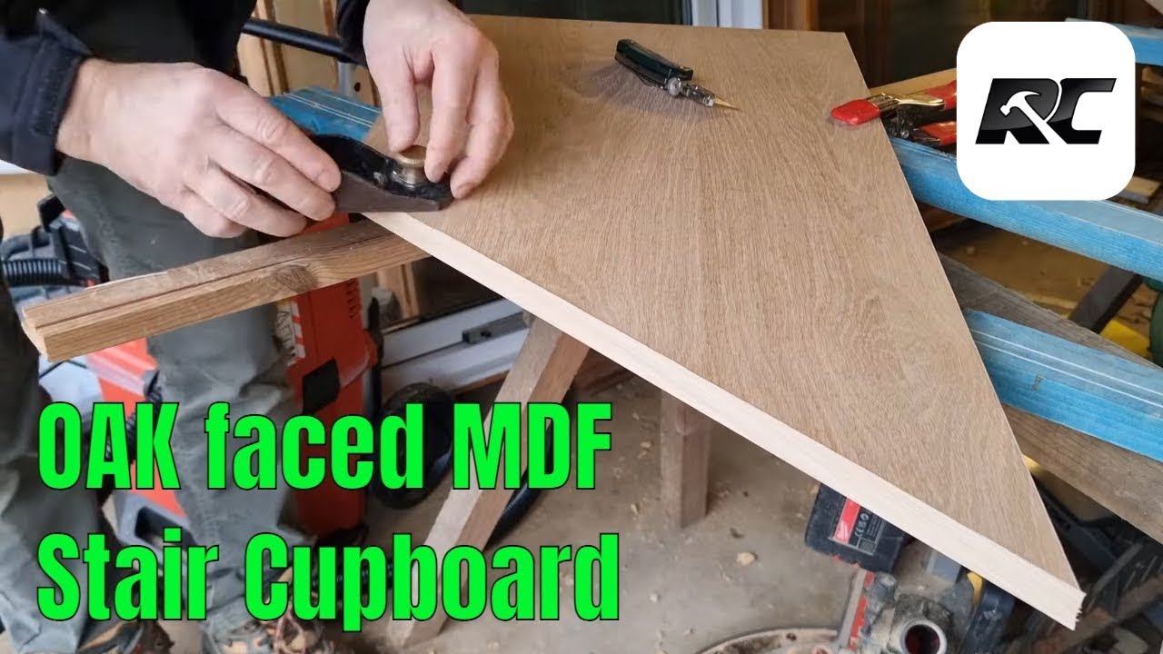 Simple under stairs cupboard front in Oak faced MDF, Blum hinges, iron on veneered edges