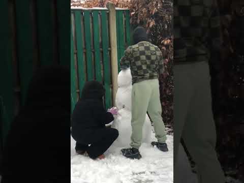 My Niece &  nephew make a snowman 