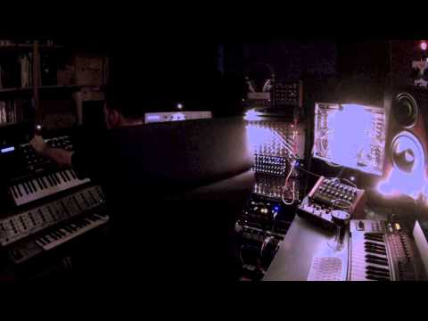 Gin Devo composing electronic industrial tracks in Vomito Negro studio