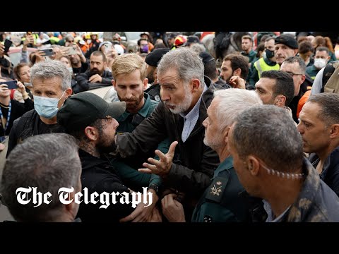 Protesters throw rocks at Spanish king on visit to flood-stricken Valencia