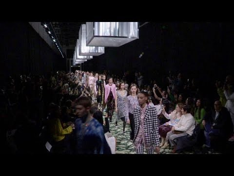 Models and designer on the runway for the Paco Rabanne Fashion Show