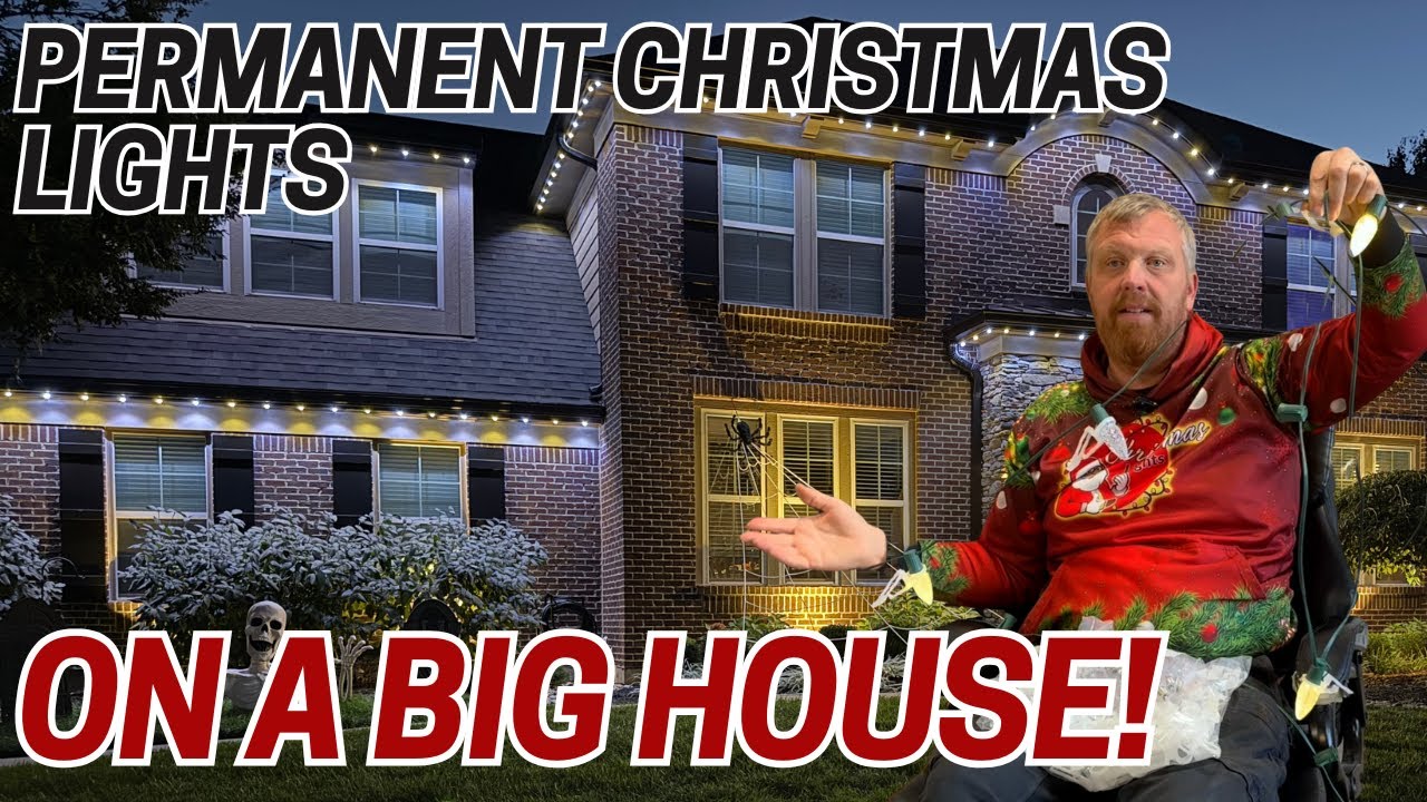 Large home with permanent Christmas lighting demonstrating professional color combinations and clean rooflines