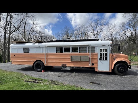 Amazing 38' Skoolie Tour with Full Bathroom & Water Tanks | Tiny House Listings