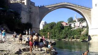 preview picture of video 'Stari Most beach scene and call to prayer - Mostar'